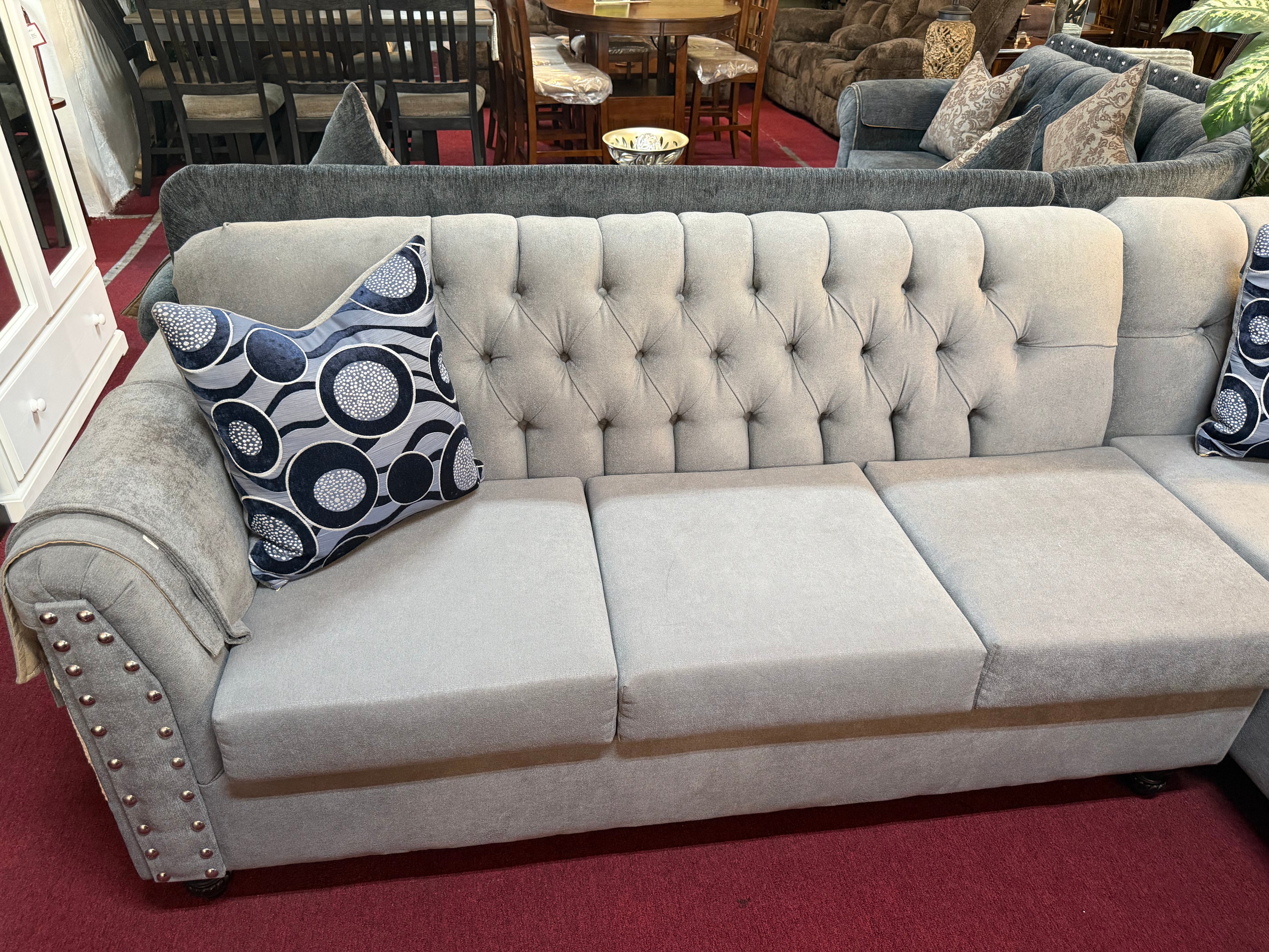 Grey Handcrafted Sectional With Blue Spotted Pillows